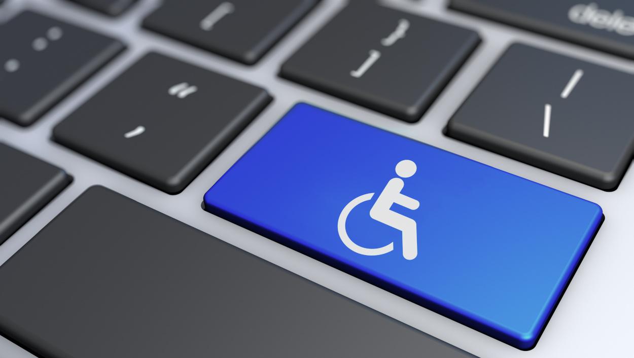 pictogramme fauteuil roulant sur clavier numérique